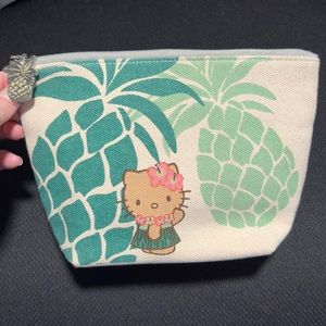 EUC Hello Kitty x ioi canvas Hawaii pineapple pouch